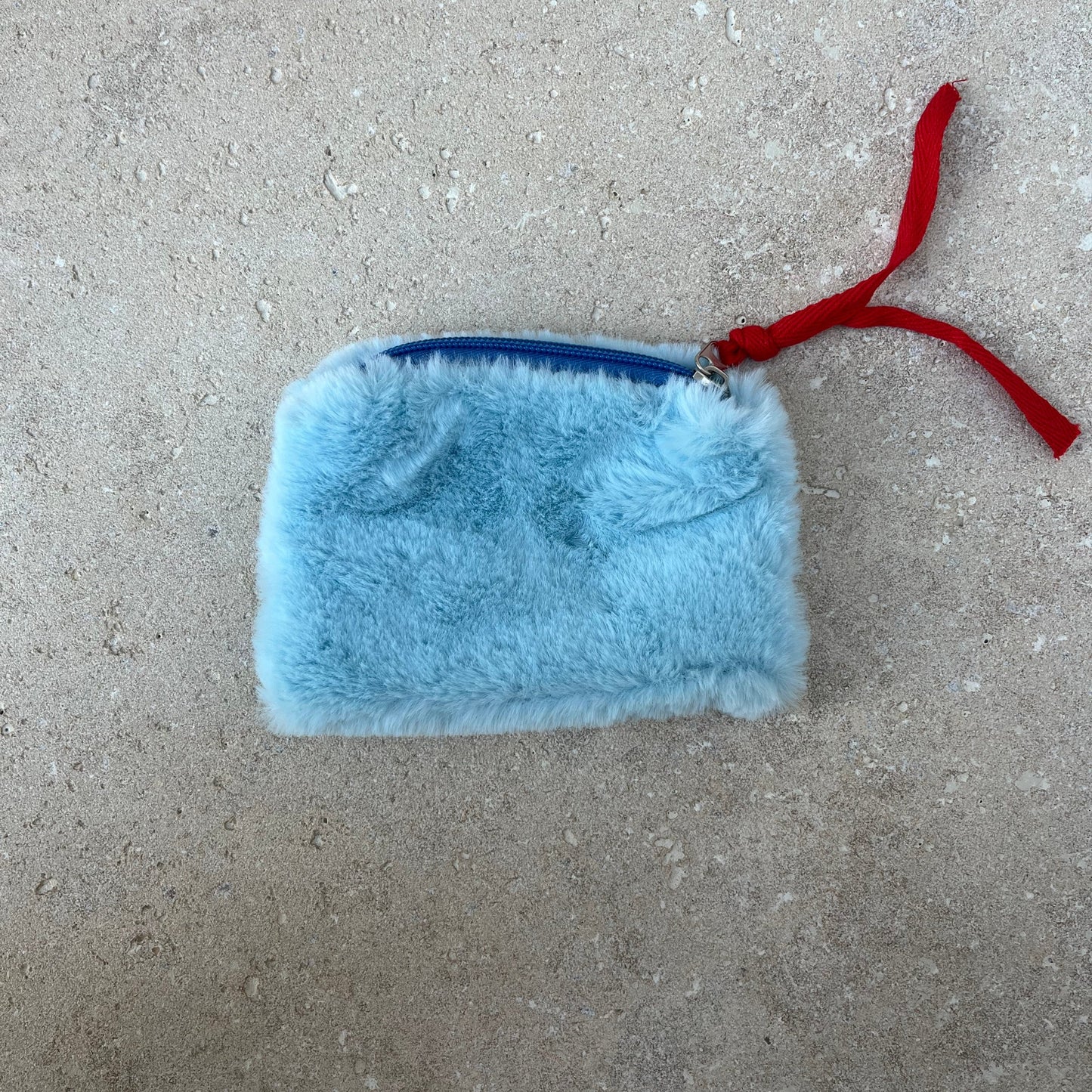 Tiny furry pouch blue