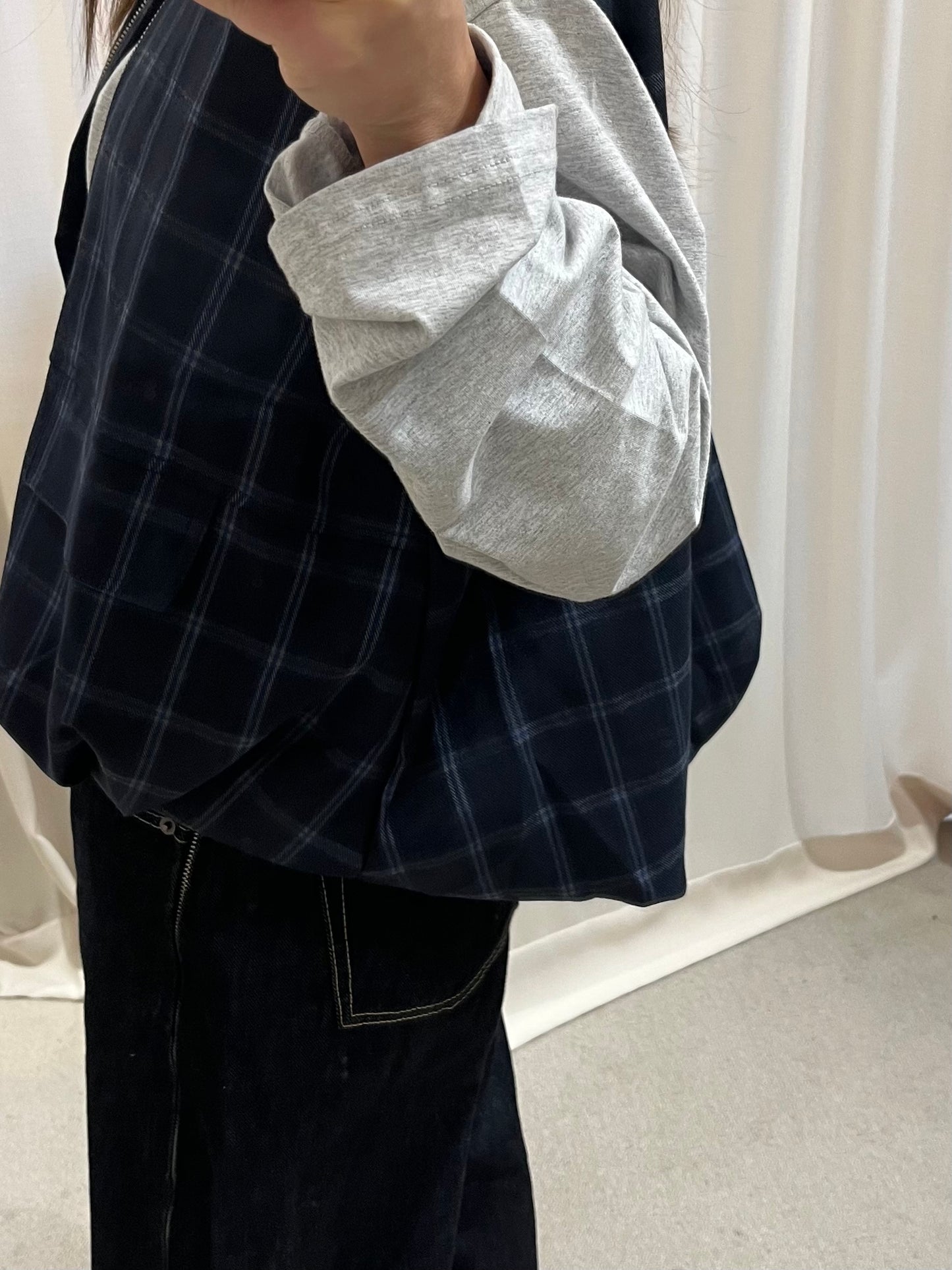 Checked sleeveless vest